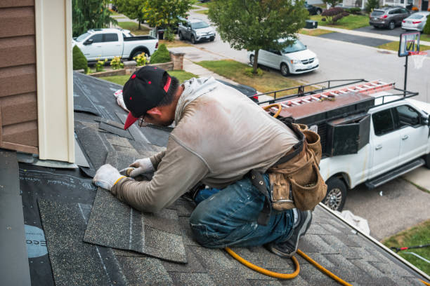 Professional Flat Roof Repair technician working in Trumansburg, NY